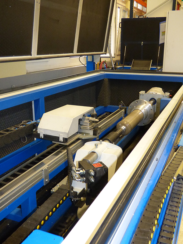 ASCOJET blasting unit including the nozzle and an exhaust system is integrated in a sound insulated enclosure